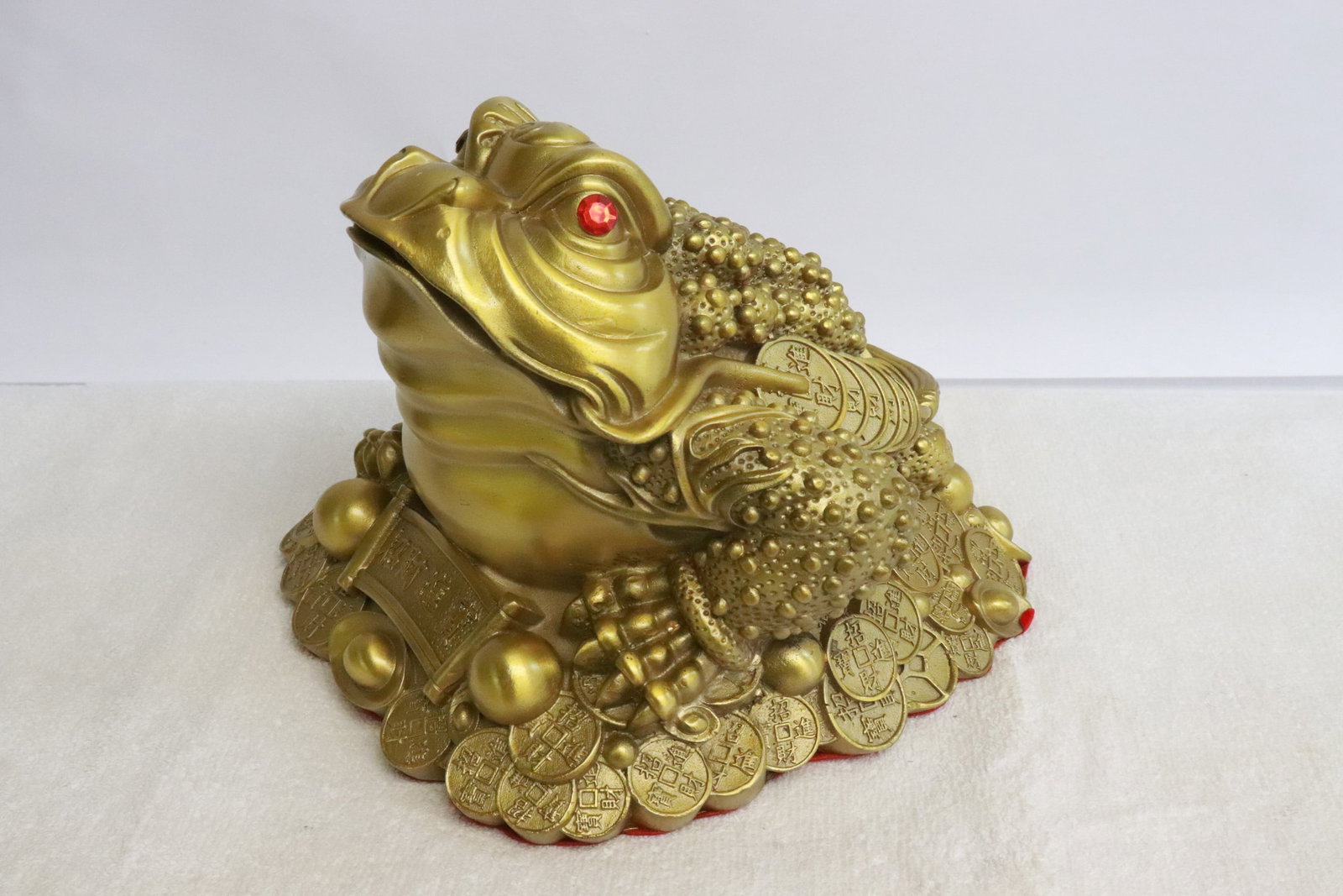 A golden color sculpture of frog: A golden color sculpture of frog, 6"H