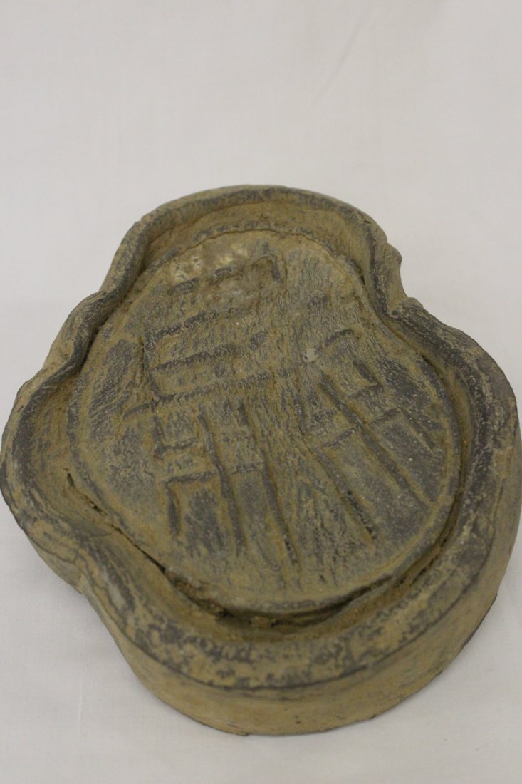 A rare Chinese Han dynasty pottery roof tile: A rare Chinese Han dynasty pottery roof tile with calligraphy symbol, 7.5"x5.7"x2.75"