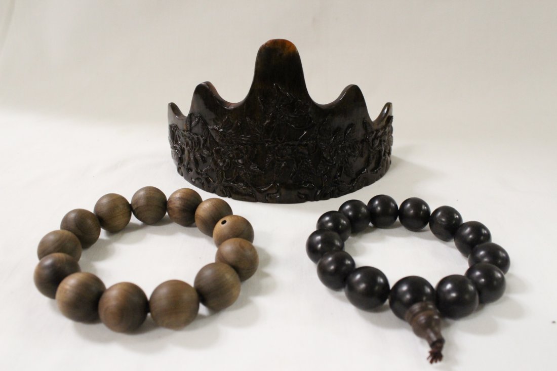 2 wood bead bracelets, and a horn head dress: 2 wood bead bracelets (13 beads each, 16mm and 17mm in diameter), and a horn head dress (3.2"Hx5.5"x2.4")