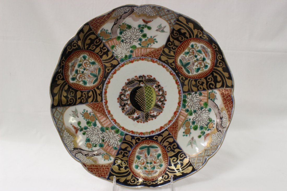 antique Japanese Arita Imari porcelain charger: Unusual antique Japanese Arita Imari porcelain charger with center depicting peach motif, 1.7"Hx12.1"dia