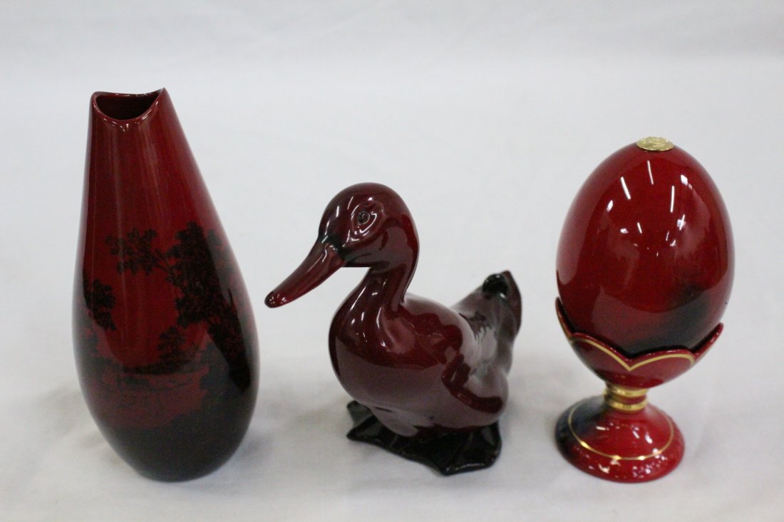 3pc Royal Doulton Flambé porcelain: 3pc Royal Doulton Flambé porcelain; a duck (5.6"Hx6.4"x2.9"), vase (6.5"Hx2.9"x2.7") with landscape painting, egg (3.6"Hx2.6"dia) with stand (2.8"Hx2.65"dia)