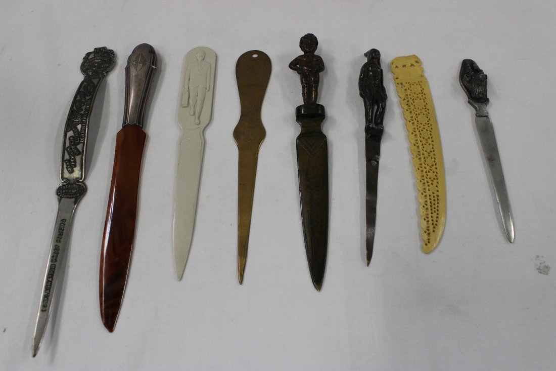 Collection of 8 letter openers: Collection of 8 letter openers, including plastic (6.85"L, 8.9"L), copper (7.9"L, 8"L, 7.3"L), white metal (6.5"L, 10.05"L) and a sterling handled example (9.2"L)