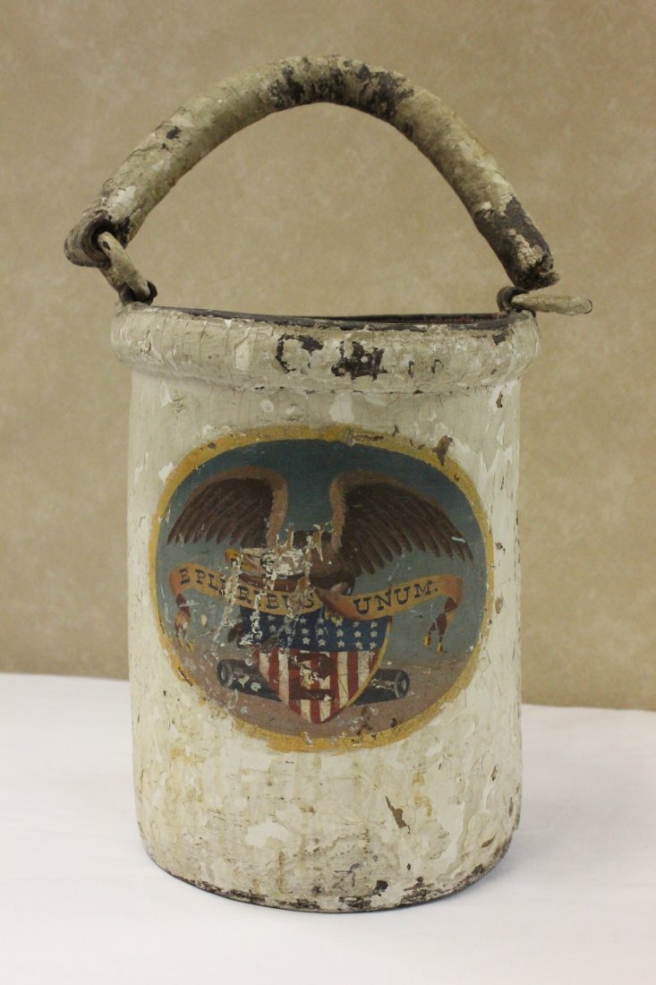A rare American antique Navy leather bucket: A rare American antique Navy leather bucket (12.55"Hx9.9"x8.6"), panel painted with US flag and eagle, the bottom mark reads U.S.N.Y. Boston (one side handle separated)