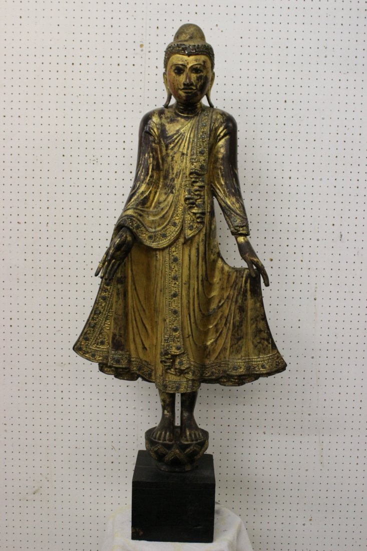 antique Burmese painted and gilt standing Buddha: A fine antique Burmese painted and gilt standing Buddha (one finger chip), 52"H
