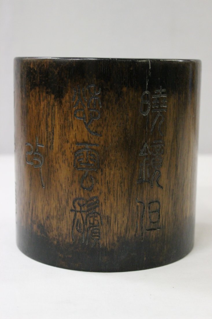 A large hardwood brush holder: A large hardwood brush holder decorated with calligraphy, 6.4"Hx6.2"dia