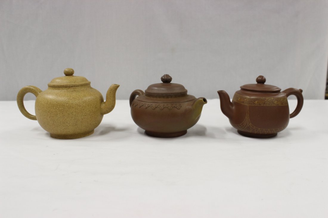 3 Yixing clay teapots: 3 Yixing clay teapots, 4.5"Hx7.15"x4.55", 4"Hx7.2"x4.75", 4.05"Hx6.3"x3.85"