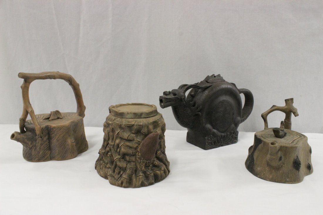 4 Yixing clay teapots: 4 Yixing clay teapots, 6"Hx8.7"x5.7", 7.7"Hx13"x3.5", 8.25"Hx9"x6.5", 5.6"Hx9.35"x6.1"