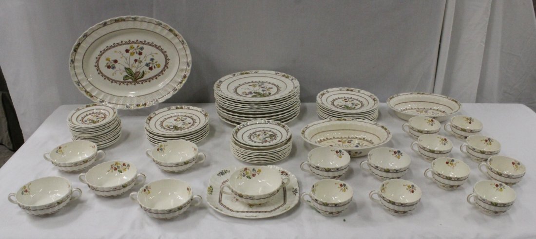 A large china set by Spode in cowslip pattern: A large china set by Spode in cowslip pattern, including 12 dinner plates, 8 lunch plates, 8 salad plates, 6 bread and butter plates, 6 soup bowls with 7 under plates, 10 cups and 9 saucers, one large