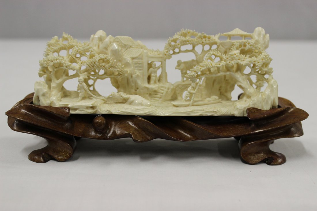 Chinese ivory carving: Chinese ivory carving (2.1"Hx6"x1.55") depicting village scene with landscape and people