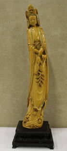 A massive Chinese ivory carved Guanyin: A massive Chinese ivory carved Guanyin, 33"H