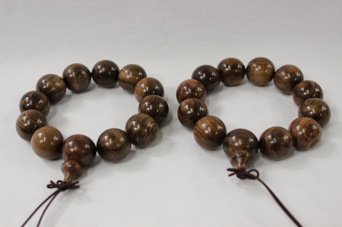 2 huanghuali wood bead bracelets: 2 huanghuali wood bead bracelets, 18mm dia each x 12 beads each