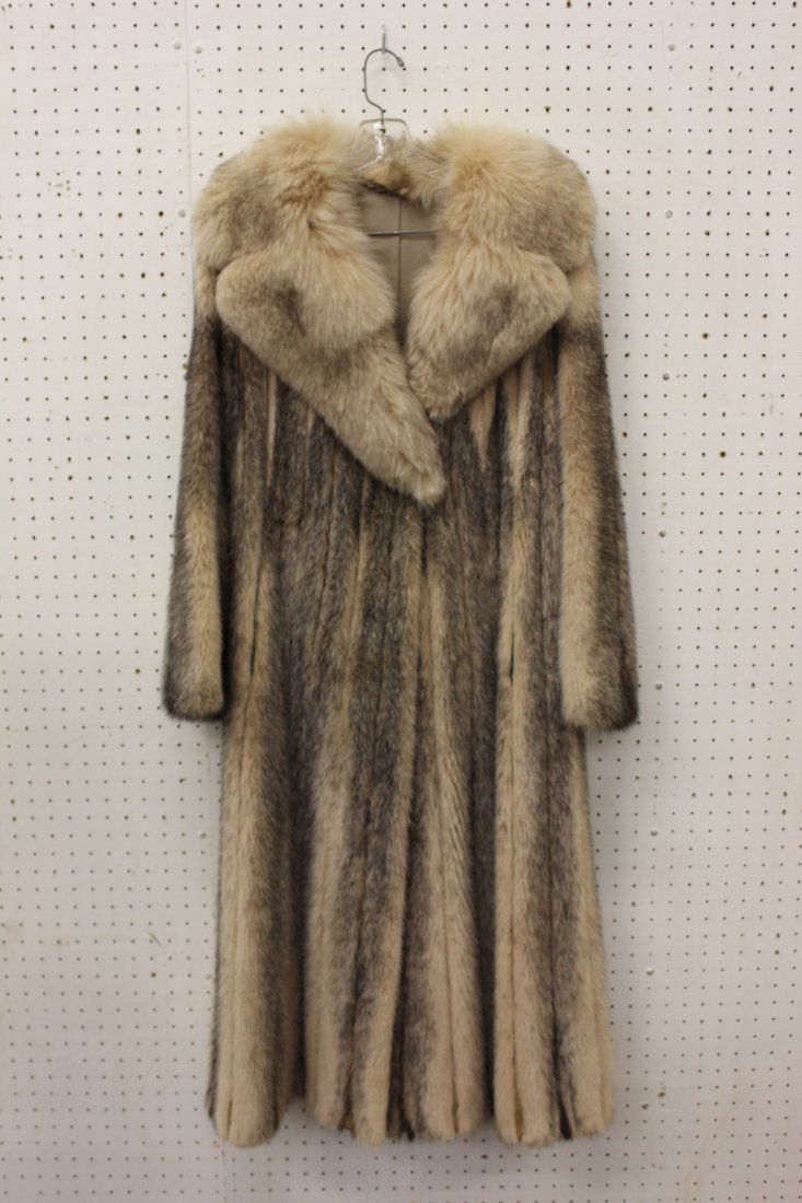 A full length lady's black cross mink coat: A full length lady's black cross mink coat with fox fur collar, 47.5"L