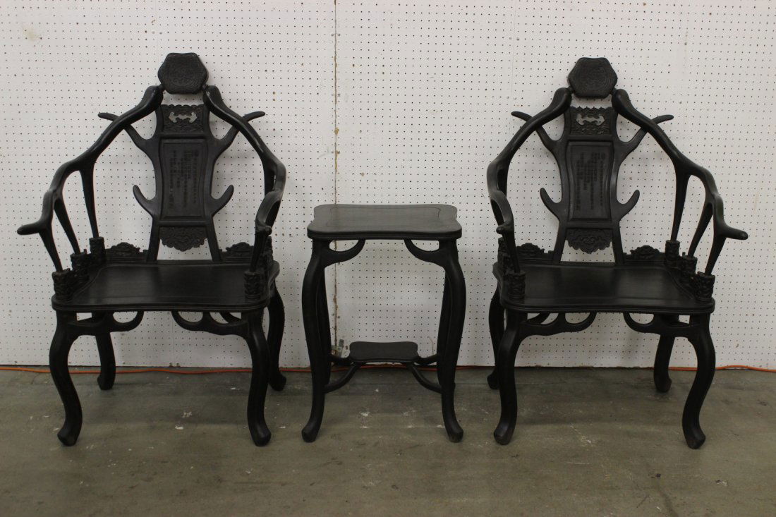 Important Chinese zitan wood 3pc set: Important Chinese zitan wood 3pc set; including center tea table (26.8"Hx15.75"x19.5") and pair armchairs (45.5"Hx28.75"x28.25" each) in deer horn form decorated with calligraphy in relief