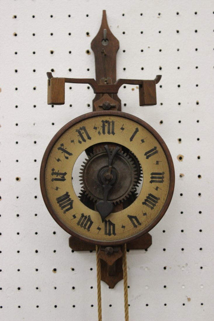 A wooden wheel clock of the Engadine "Bott"