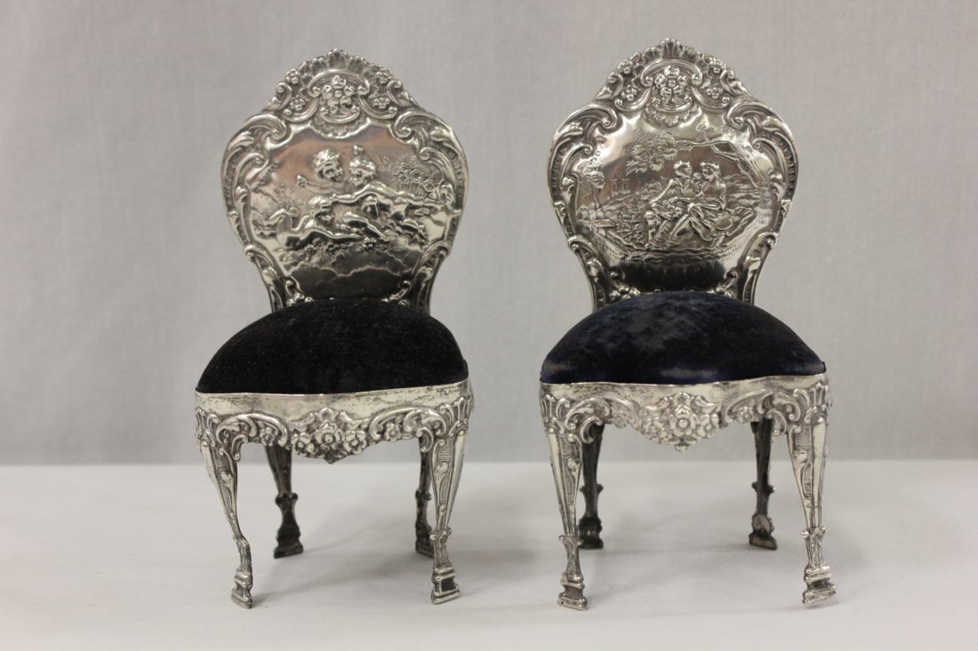 2 English sterling silver ornament in chair motif: 2 English sterling silver ornament (6"Hx3"x2.9" each) in chair motif, decorated with lover scene and angel scene, possible pin cushion, silver part wt. 118gm, Chester, by John and William Beakin, c190