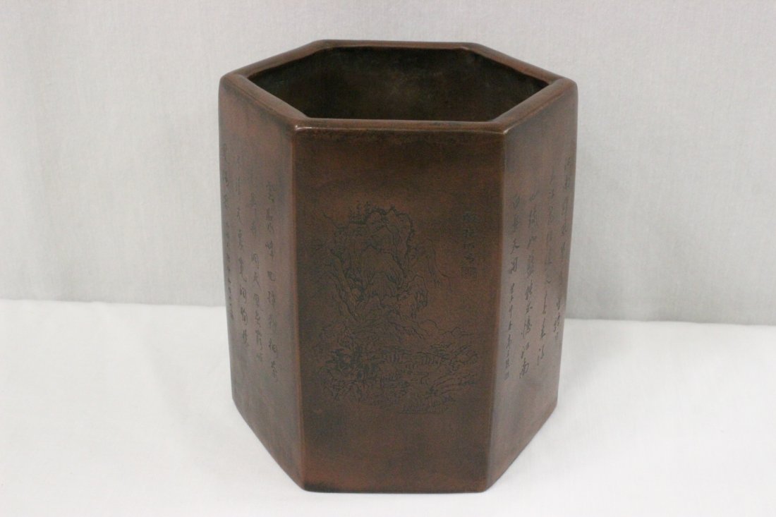 A fine Yixing clay brush holder: A fine Yixing clay brush holder decorated with landscape and calligraphy, 6.5"Hx6.2"x5.35"