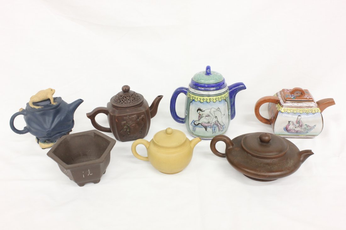 6 Yixing teapots, and a Yixing clay planter: 2 painted Yixing teapots (3.9"H, 6"H), 4 clay Yixing teapots (3"H, 3.25"H, 4.5"H, 4.85"H) and a Yixing clay planter (minor chips) (2.6"H)