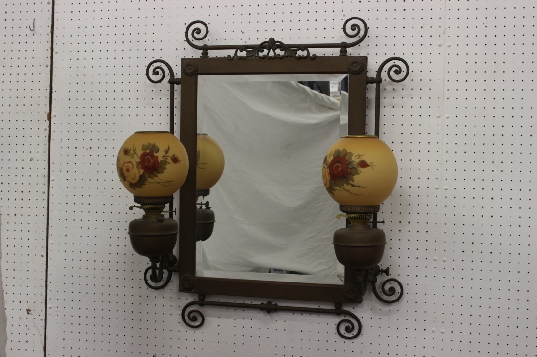 A beautiful Victorian brass wall mirror: A beautiful Victorian brass wall mirror with 2 hand painted glass globes, 37"Hx31"x12"