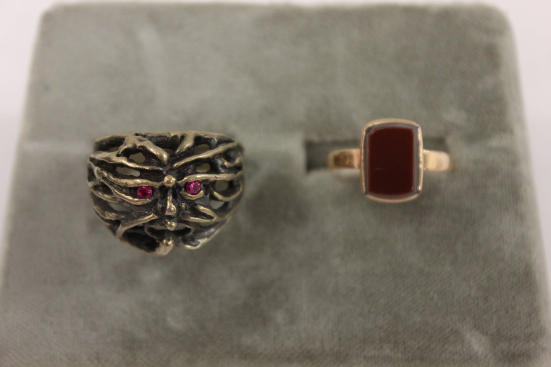 Vict. silver ring & a Vict. 14K carnelian intaglio ring: A very unusual Victorian silver ring in man's face motif, set with 2 rubies (10.2gm, size6.5), and a Victorian 14K pink gold carnelian intaglio ring (size 6)