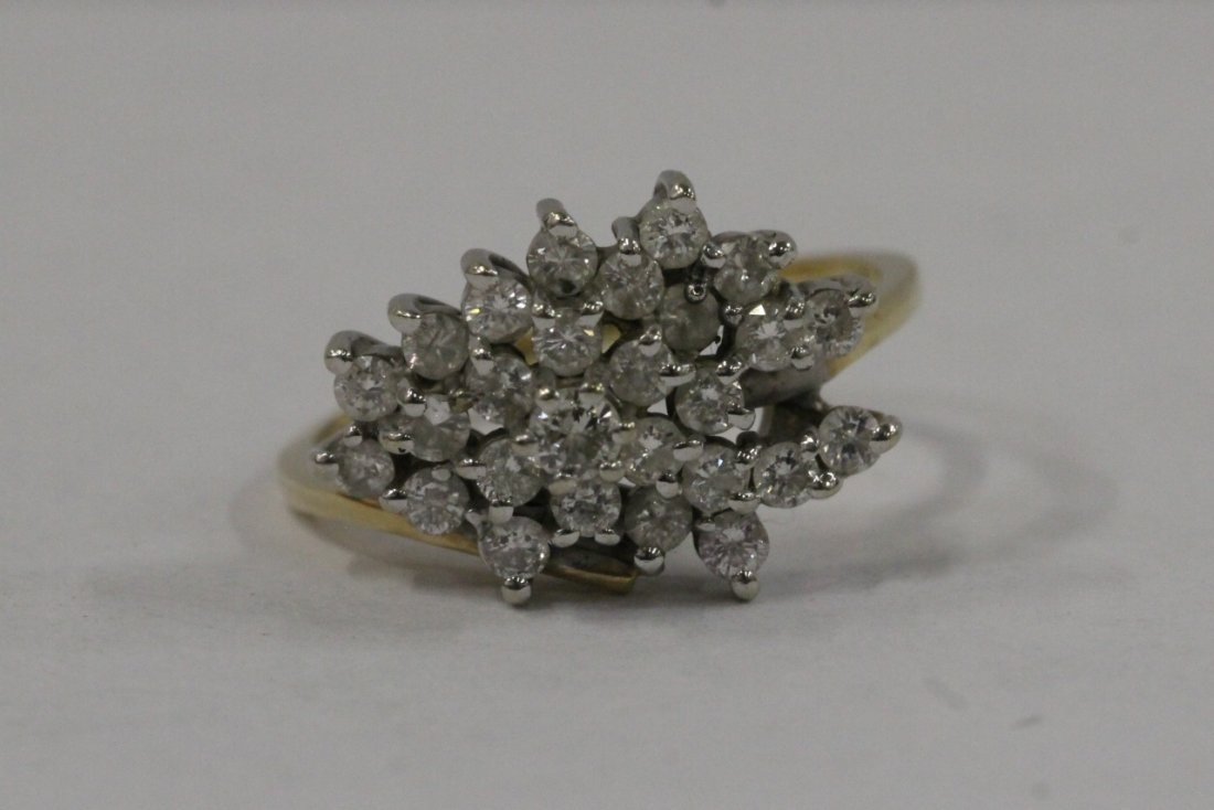 14K Y/G cocktail diamond ring: 14K Y/G cocktail diamond ring set with approx. 26 diamonds, tdw approx. 1.10ct, wt. 4.7gm, size 8.5