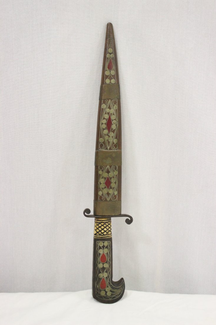 An Islamic dagger with inlaid handle and scabbard: An Islamic dagger (14"L, blade 9"L) with inlaid handle and inlaid scabbard