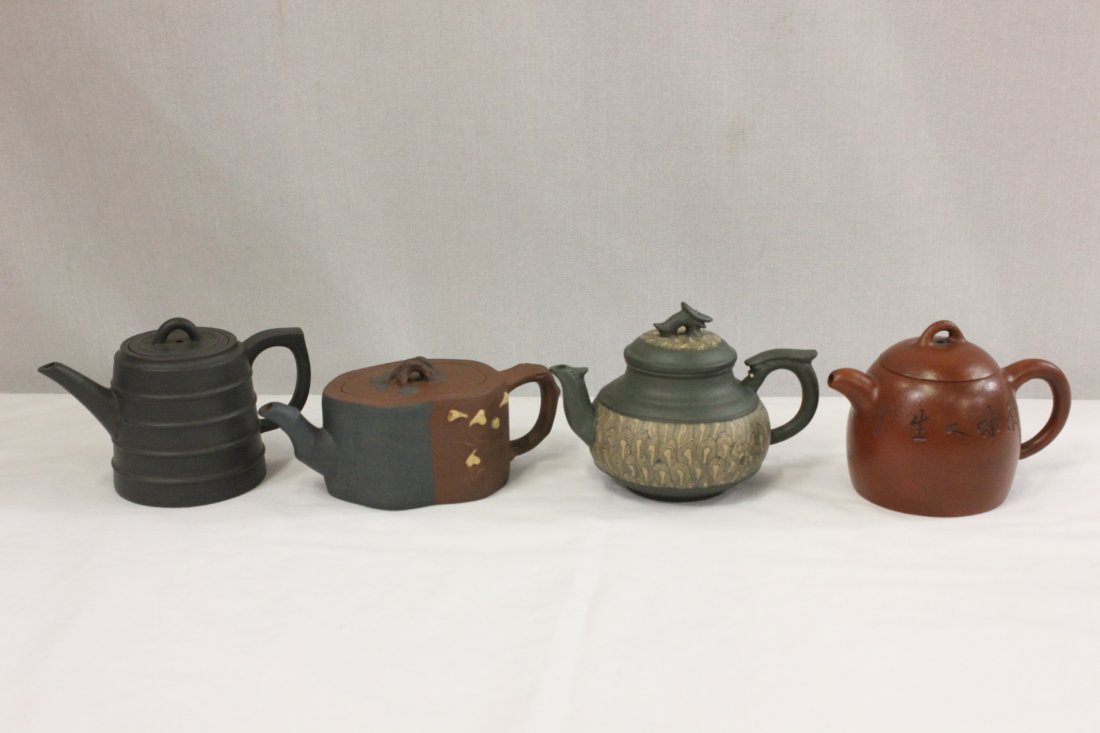 4 Yixing teapot: 4 Yixing teapot, 3.25"H, 3.55"H, 3.2"H, 2.35"H