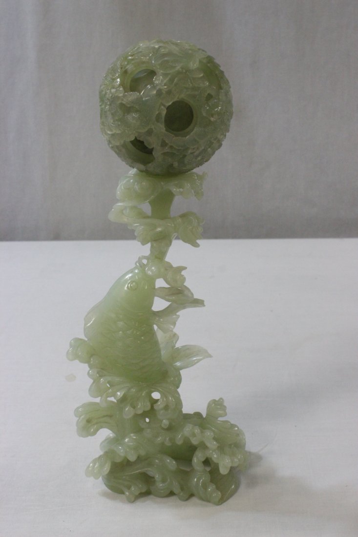 Chinese serpentine carving with multilayer balls: Chinese serpentine carving (10.1"H) depicting fish with multilayer balls