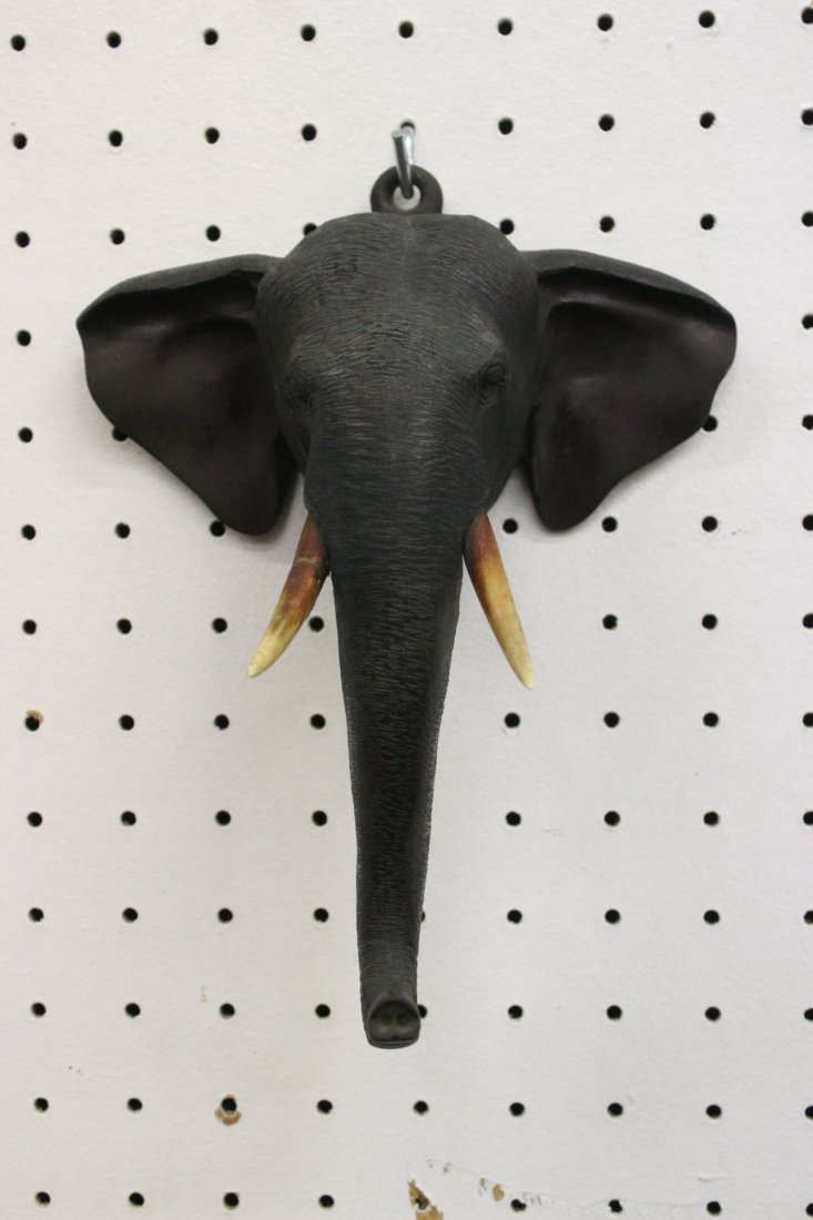 A signed Japanese antique bronze sculpture: A fine Japanese antique bronze sculpture (7.4"Hx6.6"x4") in elephant head motif, signed by artist