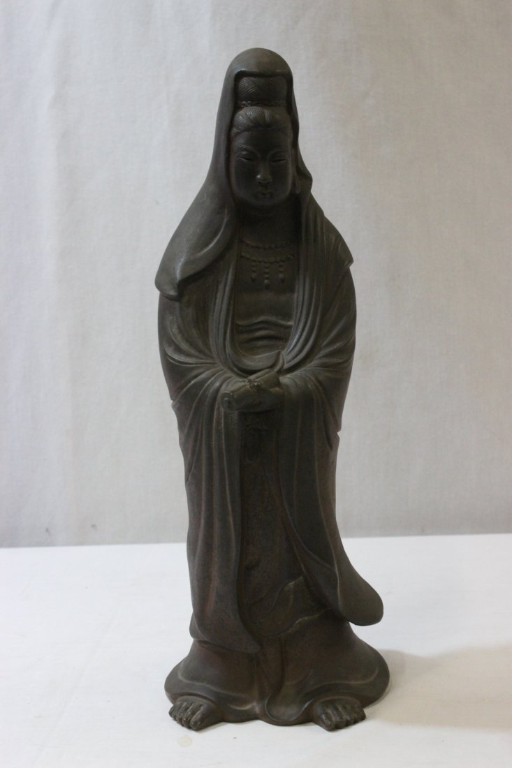 A vintage Yixing clay sculpture of Guanyin: A vintage Yixing clay sculpture of Guanyin, maker's mark, 14.5"H