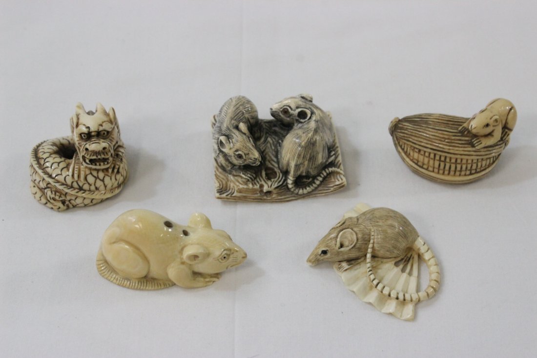 5 Japanese ivory carved netsuke: 5 Japanese ivory carved netsuke, 1.7"x1.45"x1", 1.7"x0.85"x1.1", 1.1"x1.95"x0.7", 2"x1.5"x0.6", 1.1"x1.3"x1.35". NO INTERNATIONAL SHIPPING OF IVORY
