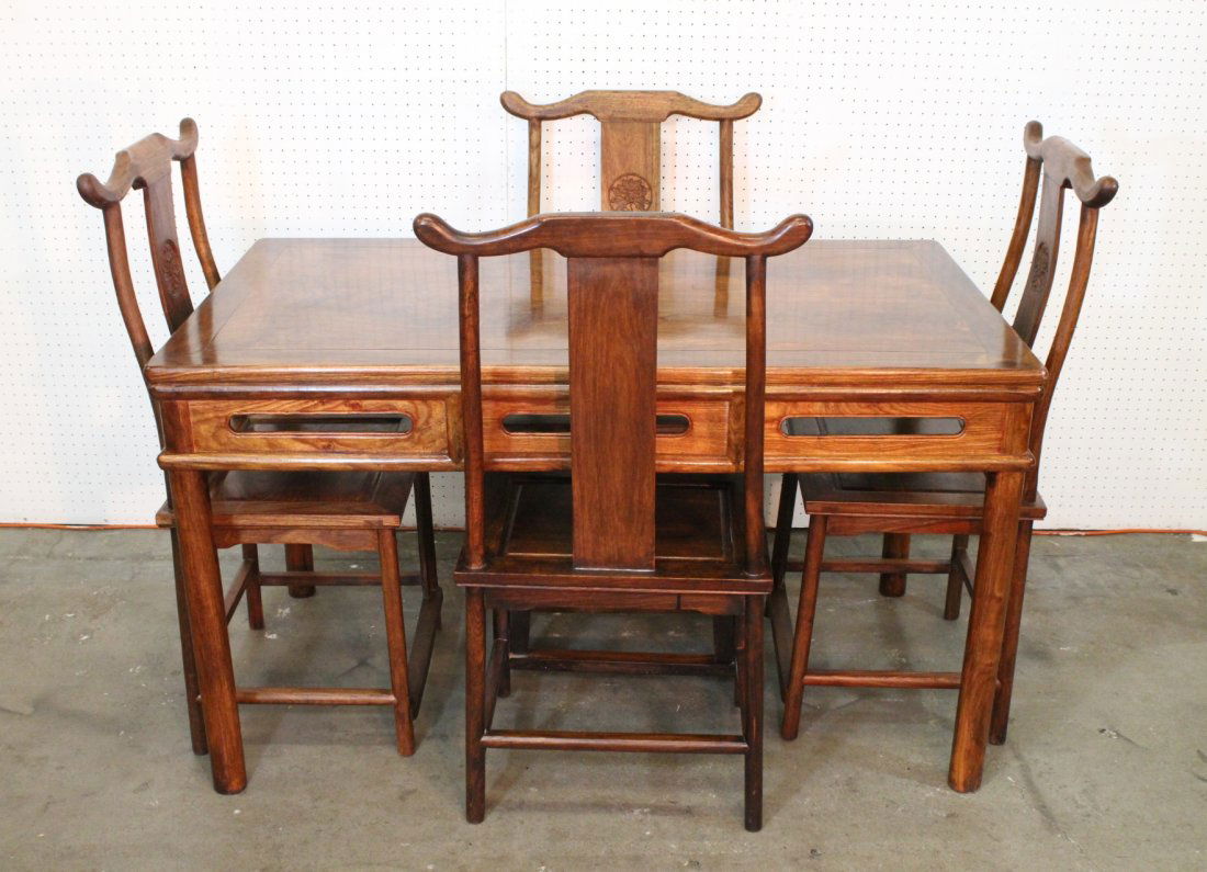 A rare huanghuali wood dining room set: A rare huanghuali wood dining room set; including a beautiful dining table (31.6"Hx54.5"x31.5") and 4 chairs (42.4"Hx21.5"x18" each)
