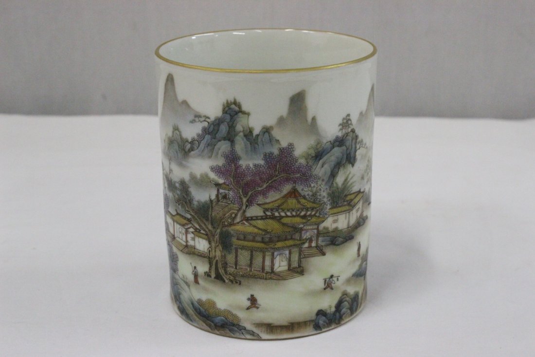 A beautiful Chinese famille rose porcelain brush holder: A beautiful Chinese famille rose porcelain brush holder (5.35"Hx4.35"dia) painted with fairy tale scene and calligraphy