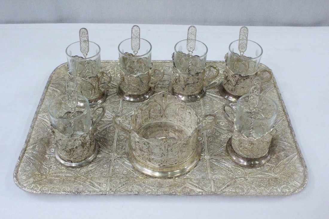 8pc Persian wire design silver wine serving set: Beautiful 8pc Persian wire design silver wine serving set; including a tray (0.5"Hx15.1"x11.3"), a wine coaster (2.65"Hx5.4"x4.3"), and 6 wine cup holders (2.5"Hx3.2"x2.5" each) with glass insert and