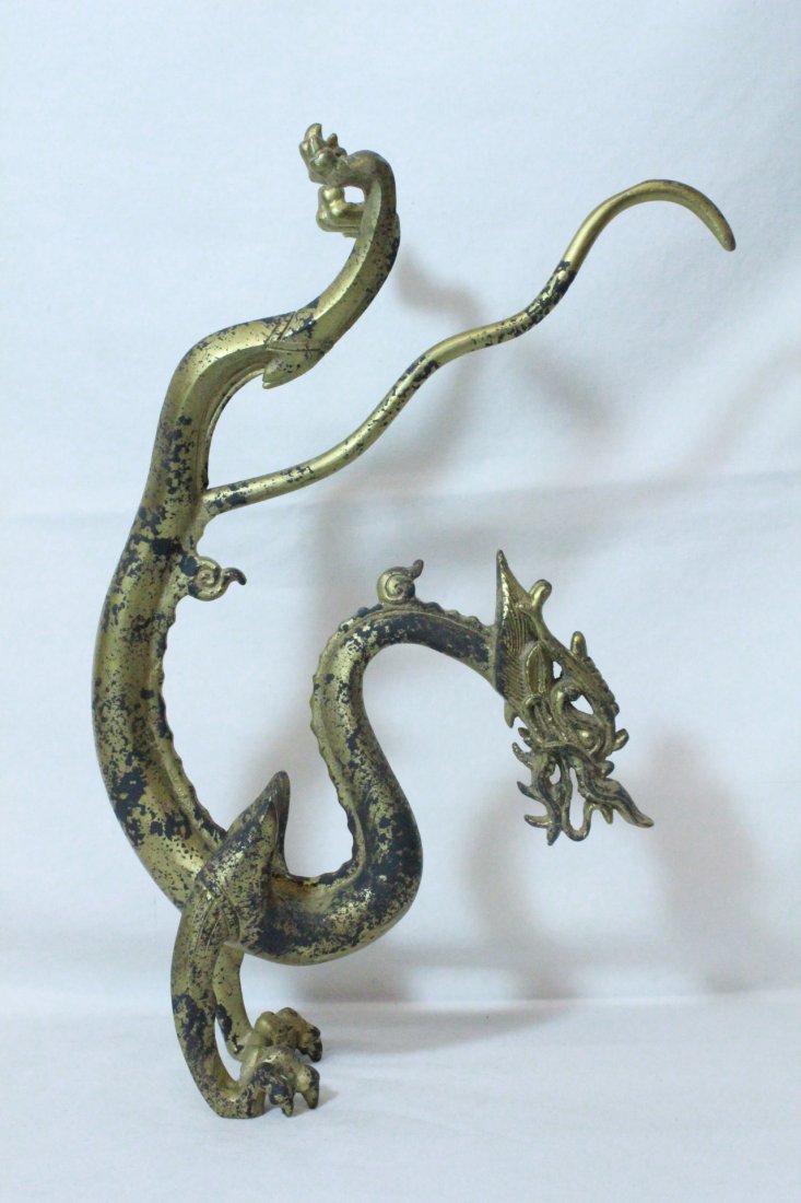 A fine Chinese gilt bronze dragon: A fine Chinese gilt bronze dragon, a well balanced example, 14"H