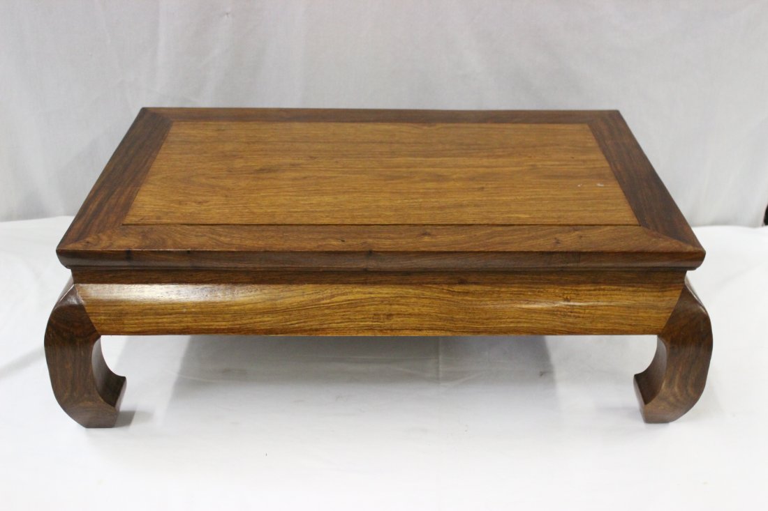 A fine huanghuali wood low table: A fine huanghuali wood low table, 9.25"Hx28.4"x18"