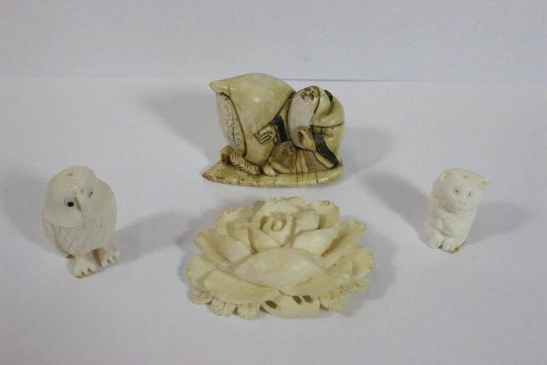 4pc ivory: 4pc ivory; a flower motif (2"x1.45"), a signed Japanese netsuke (1.45"x1.8"x1.25") and one owl (1.25"H), one bear (1"H), NO INTERNATIONAL SHIPPING OF IVORY