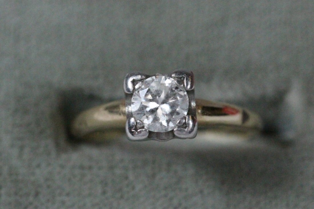 14K Y/G diamond ring: 14K Y/G ring, center an excellent quality diamond (VS), wt. approx. 0.50ct, wt. 2.2gm, size 4.5