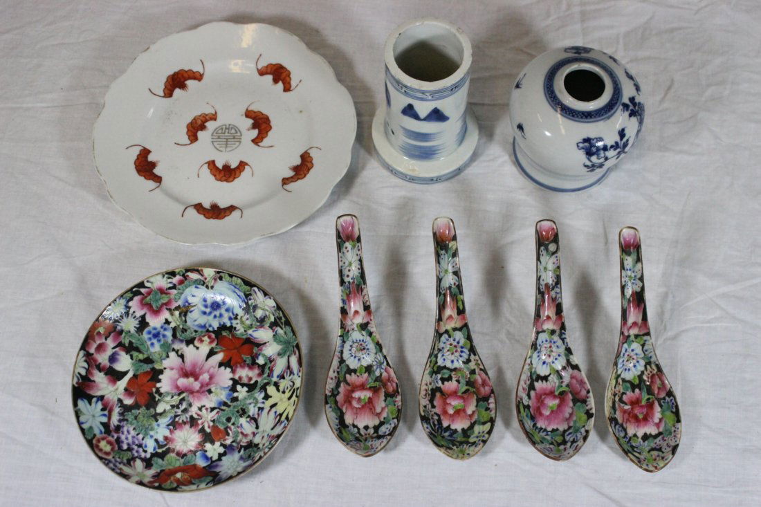 2 b&w porcelains and 6 famille rose pieces: 8pc; Chinese blue and white small jar (3.3"Hx3.25"dia), blue and white brush holder (4.05"Hx2.85"dia), 2 famille rose porcelain small plates (5.5"dia, 7"dia), and 4 famille rose spoons (5.7"L each)