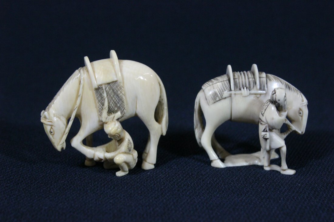 2 Japanese antique ivory carved netsuke: 2 Japanese antique ivory carved netsuke depicting man with horse, 1.3"H, 1.6"H, NO INTERNATIONAL SHIPPING OF IVORY