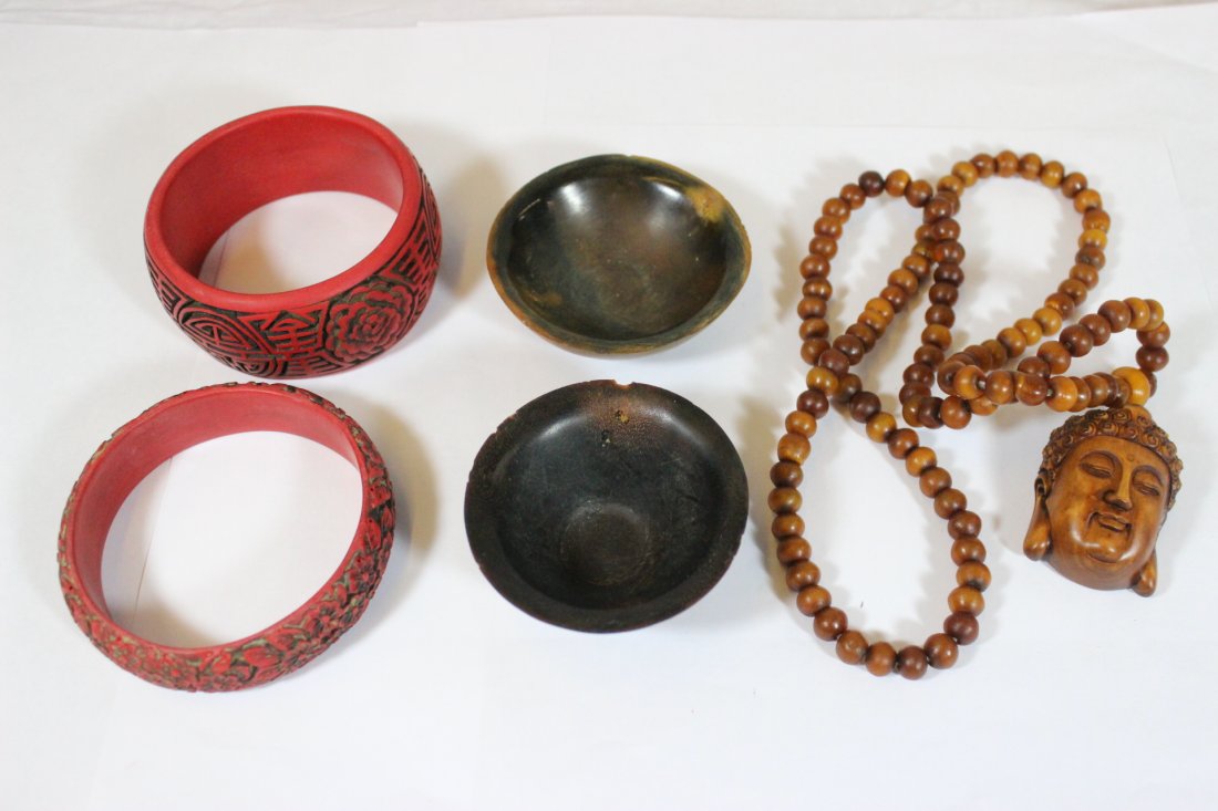 5 items: 5 items; wood carved Buddha head (1.8"H) with wood bead (0.35"dia (108)) necklace, 2 cinnabar style bracelets (0.75"Dx3.15"od, 1.35"Dx3.15"od), 2 horn style small bowls (0.9"Hx2.75"dia, 1.1"Hx2.5"dia)