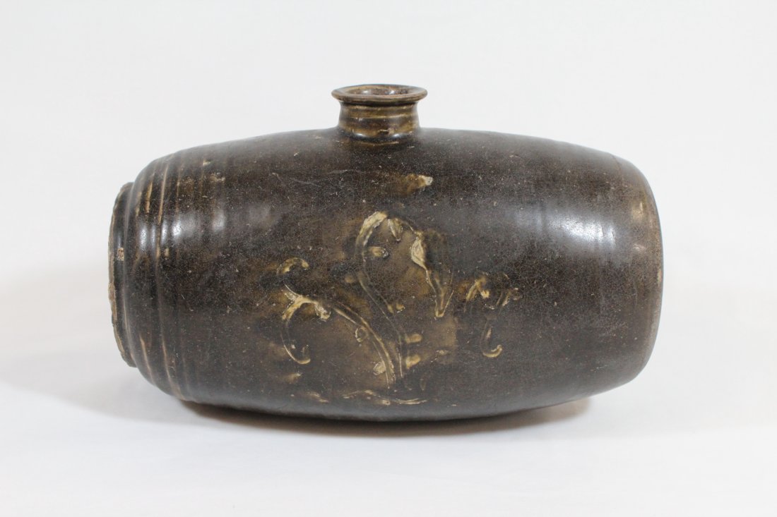 A Korean brown glazed wine bottle: A Korean brown glazed wine bottle, 6.6"Hx10.5"x5"