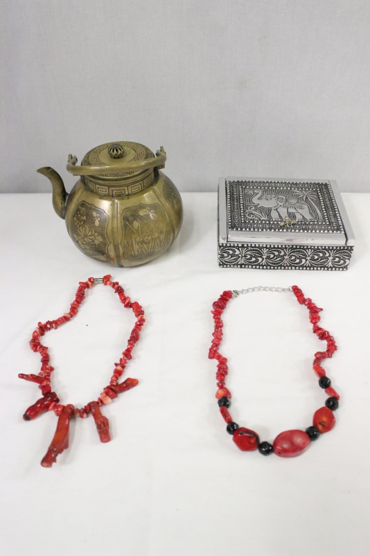 4 items: 4 items; a brass teapot (5.25"Hx6.35"x5.75"), a tin box (1.9"Hx5.9"x4.95") and 2 coral necklace (17.2"L, 16.2"L)