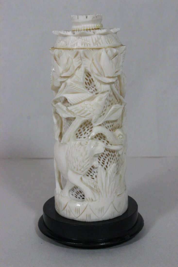 African ivory carved box: African ivory carved box (top sealed), 4.9"Hx1.85'dia. Ivory is African origin, it has been in private collection since 1950's. NO INTERNATIONAL SHIPPING OF IVORY