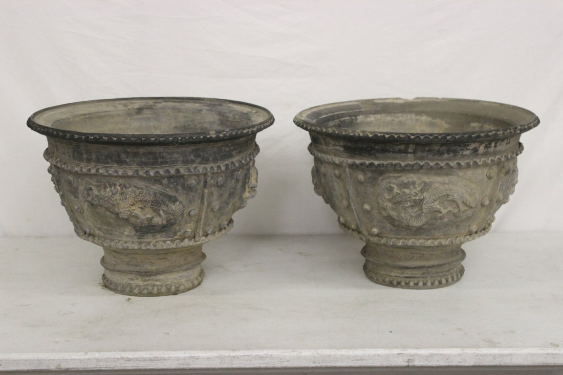 Pr important Chinese Ming dynasty pottery planter: Pair important Chinese Ming dynasty pottery planter (14"Hx19.7"dia each) decorated with dragon in high relief