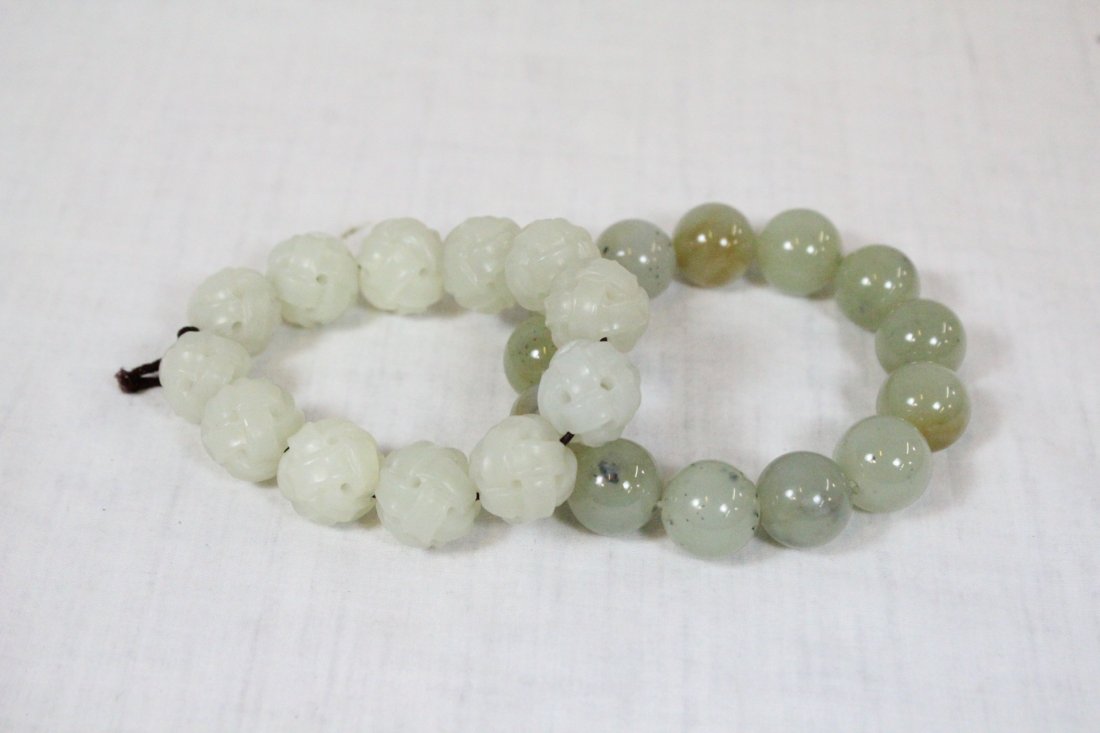 2 Chinese jade bead carved bracelets: 2 Chinese jade bead carved bracelets (0.6"-0.7" dia. each)