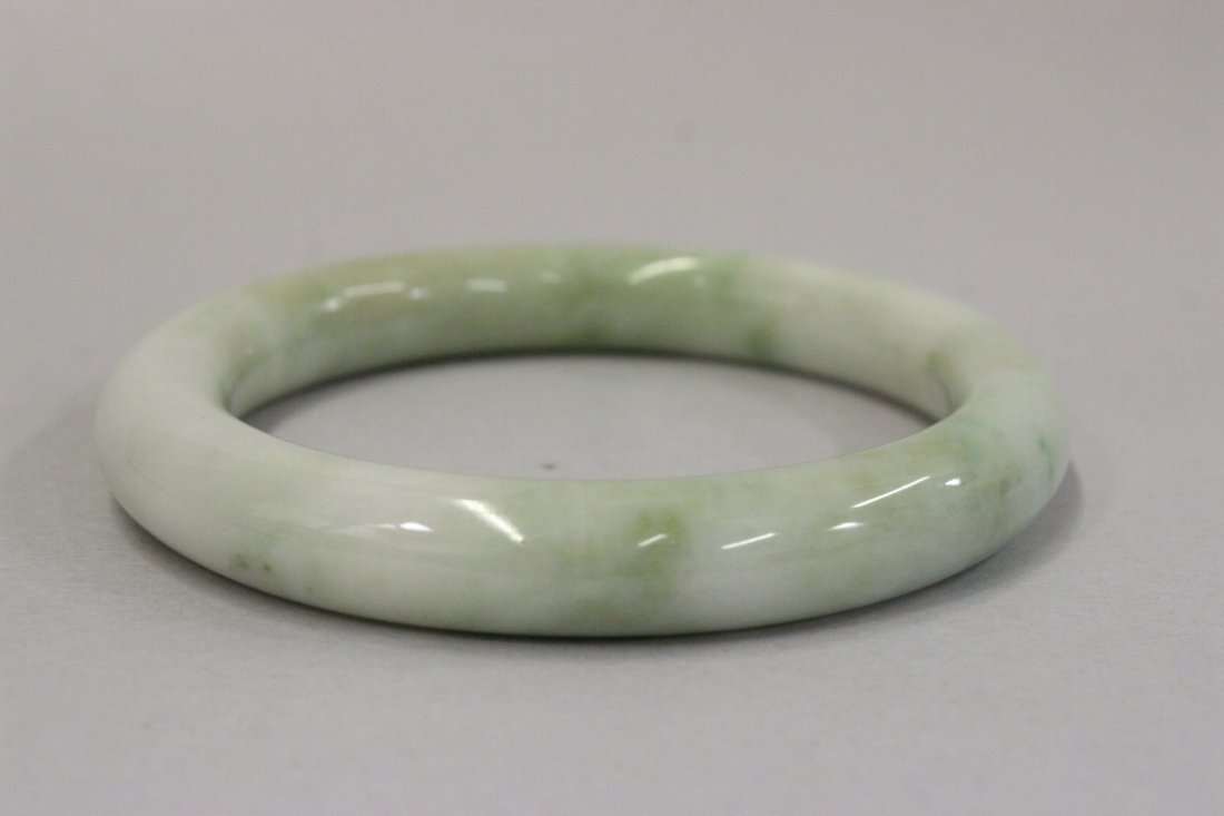 A fine mutton fat jadeite bangle bracelet (1 of 9)