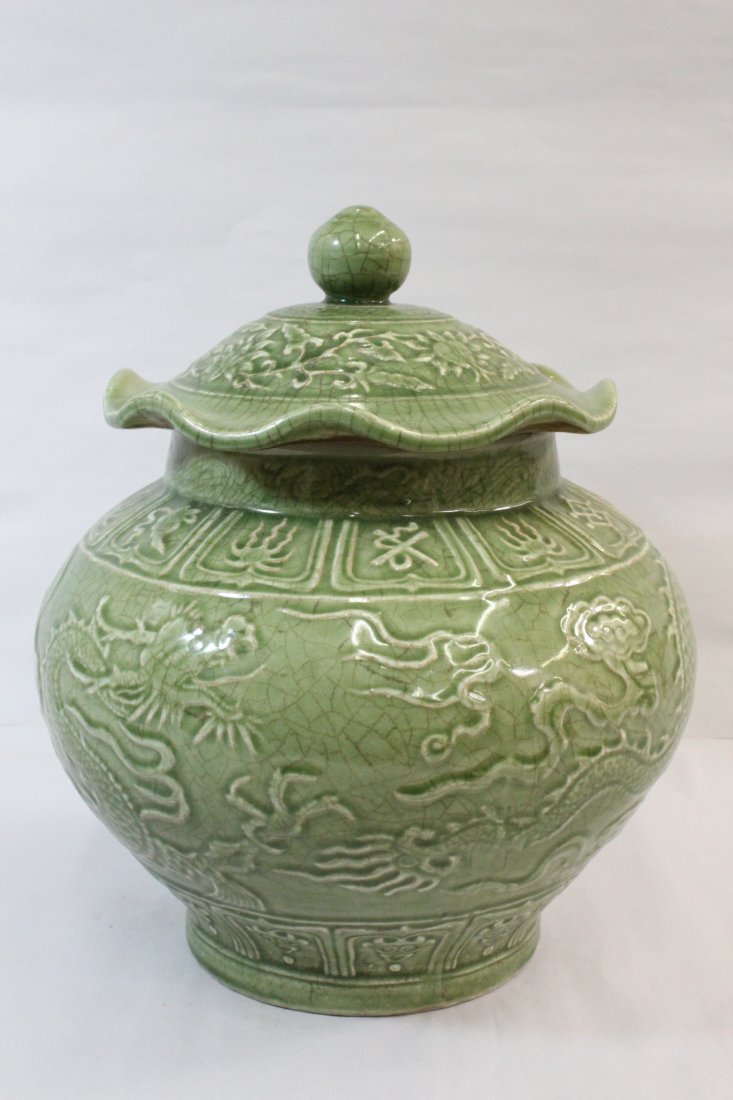 A large Chinese celadon glazed covered jar (1 of 10)