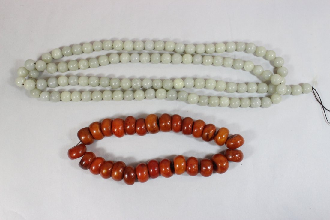 A jade bead necklace, and an amber like bead necklace (1 of 10)