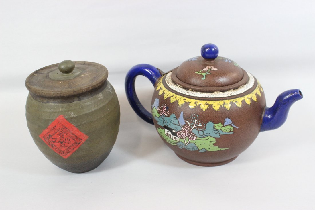 Vintage tea sealed in tea caddy, and a Yixing teapot: Vintage Puer tea (普洱茶) sealed in tea caddy (5.75"Hx4.5"dia), and a fancy Yixing€³èŒ¶ teapot (6"H)