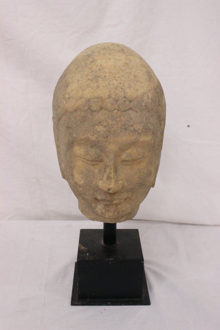 Stone carved Buddha head on stand (1 of 8)